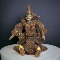 A CARVED WOODEN BURMESE MARIONETTE PUPPET. WITH JEWELLED HEADDRESS AND ELABORATE DRESS. LENGTH -