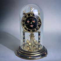A PAINTED KUNDO (KIENINGER & OBERGFELL) ANNIVERSARY CLOCK. WITH GLASS DOME. HEIGHT - 30CM