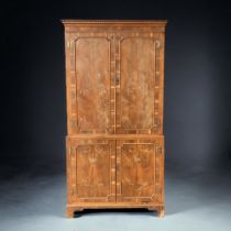 A BURR YEW WOOD COCKTAIL CABINET.