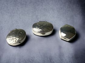 3 silver snuff or pill boxes 2 of oval shape the other angular