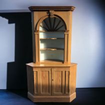 A TALL PINE BARREL BACK CORNER CUPBOARD.