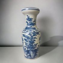 A CHINESE BLUE & WHITE PORCELAIN VASE. QING DYNASTY. PAINTED WITH EXOTIC BIRDS AMONGST BLOSSOMING