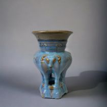 A CHINESE JUN GLAZE 'RAMS HEAD' INCENSE BURNER / VASE. HEIGHT - 19CM