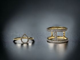 Two modernist CZ gold on 925 silver rings size P 1/2 and R 1/2.