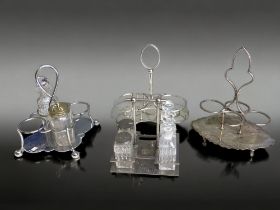FOUR VICTORIAN SILVER PLATE CONDIMENT SETS & STANDS.