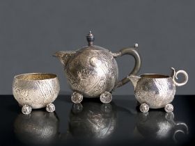 A very rare sterling silver bachelor's tea set. By Elkington & Co, with American firm of George