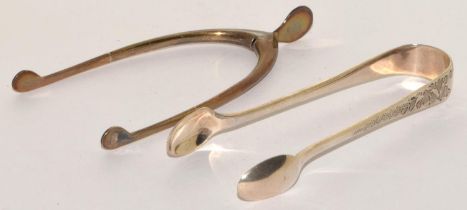 Silver wish bone sprung hinged sugar nips together with a silver pair of scope nips