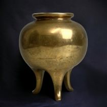 A CHINESE GILT BRONZE TRIPOD CENSER. CURVED TRIPOD LEGS WITH ROUND BODY. MARKED TO BASE. HEIGHT -