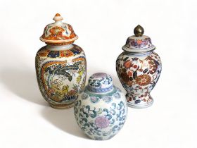 A LOT OF THREE LARGE CHINESE & CHINOISERIE LIDDED VASES & JAR.