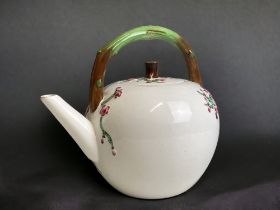 A SCARCE CHRISTOPHER DRESSER FOR MINTON PORCELAIN TEAPOT. CIRCA 1872. RELIEF DECORATED JAPONESQUE