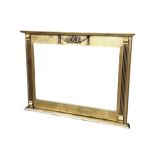 A gilt wood over mantle mirror. 107 x 65cm