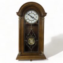 A PRESIDENT QUARTZ WALL CLOCK. WITH WESTMINSTER CHIME.