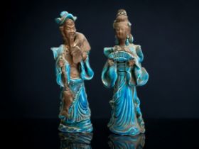 Pair of 18th century Chinese stoneware figures, overlaid with a thick turquoise glaze. Height - 25cm
