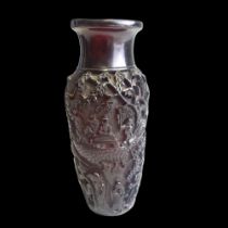 A Chinese deep carved Cherry Amber vase. Qing dynasty. Elaborately carved with landscape scenes,