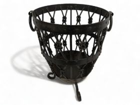 A Large Wrought Iron Log Basket