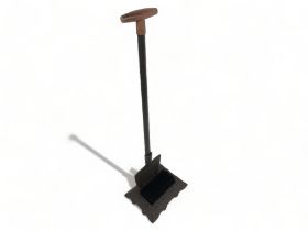 A Cast Iron Boot Scraper + brush shaped like a spade