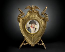 A 19th Century French 'Grand Tour' Napoleon portrait in Ormolu frame. It is watercolour on a thin