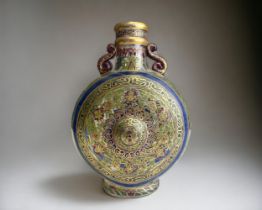 A signed Fritz Heckert glass moon bottle flask. Enamel painted Persian design. Circa 1900 Signed