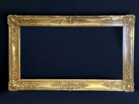 A 19TH CENTURY GILTWOOD MIRROR. 107 X 64 CM MIRROR AS BEEN REPLACED.