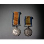 TWO WWI GEORGE V BRITISH WAR MEDALS. WITH RIBBONS. ONE NAMED 'DVR. T. SEAL. R.E.' THE OTHER