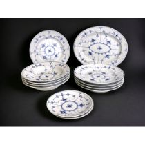 A collection of Royal Copenhagen 'Blue fluted half lace' pattern dinner wares. Including plates,
