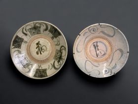 TWO MING DYNASTY (KITCHEN MING) SWATOW BOWLS. LARGEST DIAMETER - 26.5 CM AF - CHIP TO RIM OF ONE