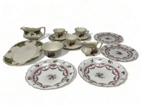 A mixed collection of English ceramics. Including George Jones crescent plates, Myott cups & saucers