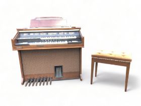 A KAWAI ELECTRONIC ORGAN & STOOL.