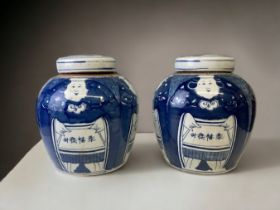 A LARGE PAIR OF CHINESE HAND PAINTED PORCELAIN BLUE & WHITE LIDDED JARS. 20TH CENTURY. HEIGHT - 25CM