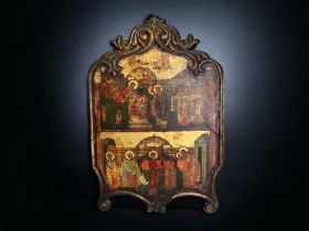 A large 19th century Religious Icon. Painted on board, with carved frame. 55 x 37 cm