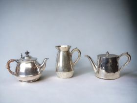 TWO 19TH CENTURY SILVER PLATE TEAPOTS AND HOT WATER JUG.