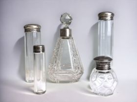 A Large tapering cut glass silver mounted scent bottle, German 800 grade marks, together with four