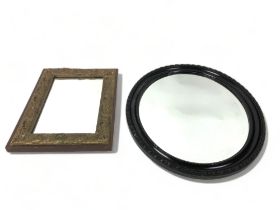 A Gilt plaster wall mirror, together with an Oval wall mirror.