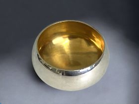 An early Stuart Devlin design silver bowl. Plain design, with narrow foot and parcel gilt