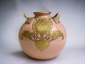 A 19TH CENTURY PORCELAIN GLOBULAR FORM VASE. BABY PINK GROUND WITH GILT OVERLAY DESIGN. HEIGHT -