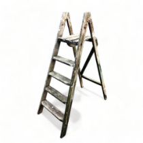 A vintage wooden step ladder.