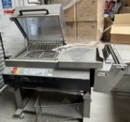 EKH-455 Shrink Wrapper (LOCATION: Mansfield)