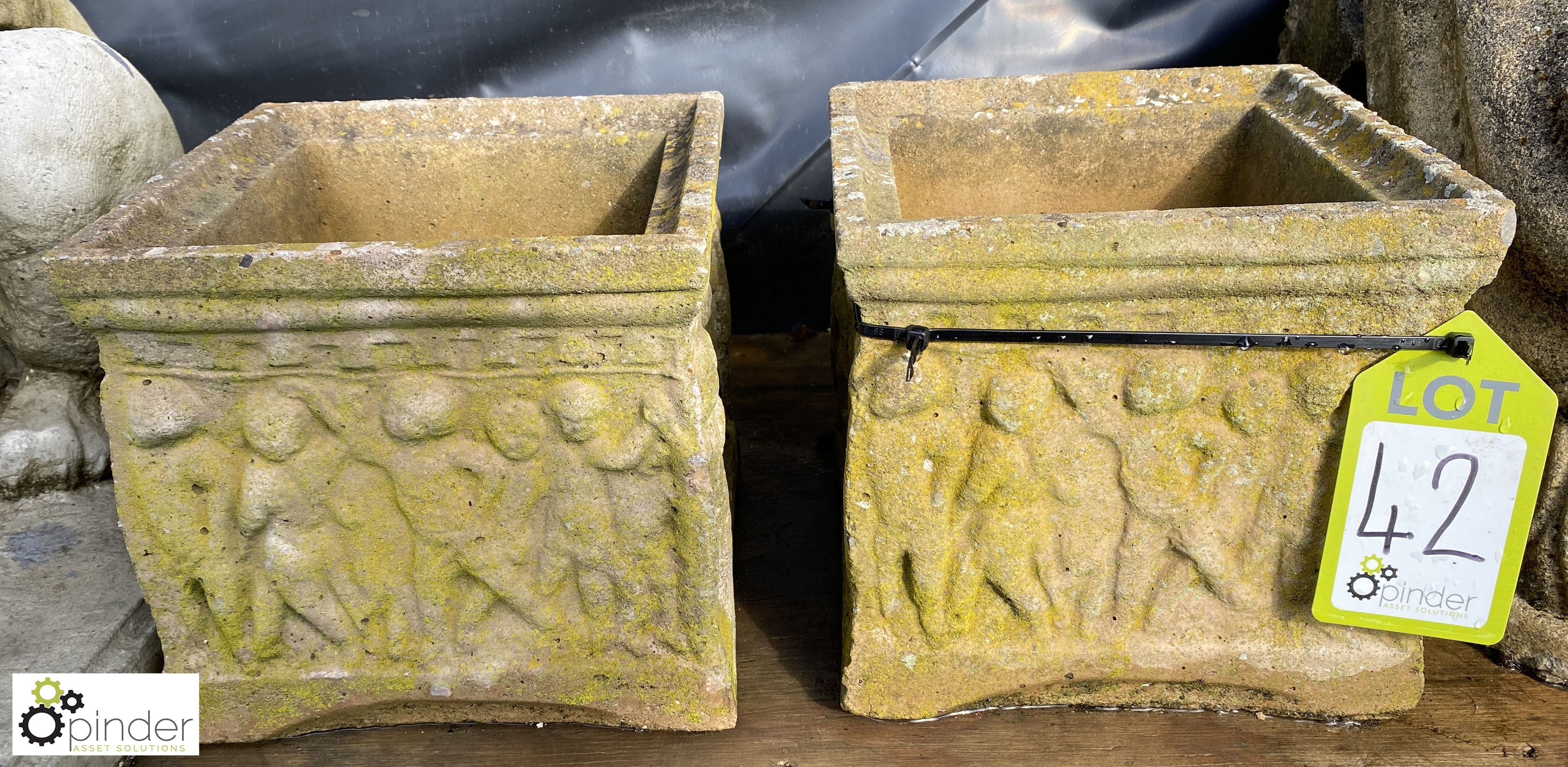 A pair of square reconstituted stone Planters with