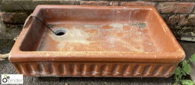 A Victorian salt glazed terracotta Sink with flute