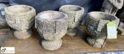 4 reconstituted stone Urns with Greek key and flor