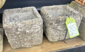 A pair of reconstituted stone Planters with wallin