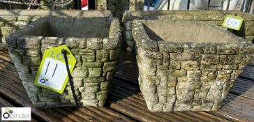 A pair of square reconstituted stone Planters with