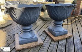A pair of large cast iron garden Urns with acanthu