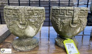A pair of reconstituted stone Garden Urns with Gre