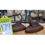 A pair of cast iron antique Irons, numbers 5 & 6,