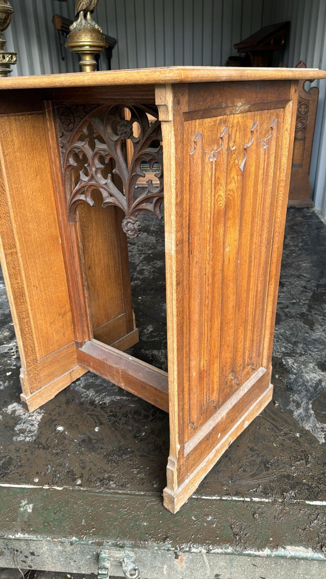 A oak gothic Table, with carved gothic fret linen