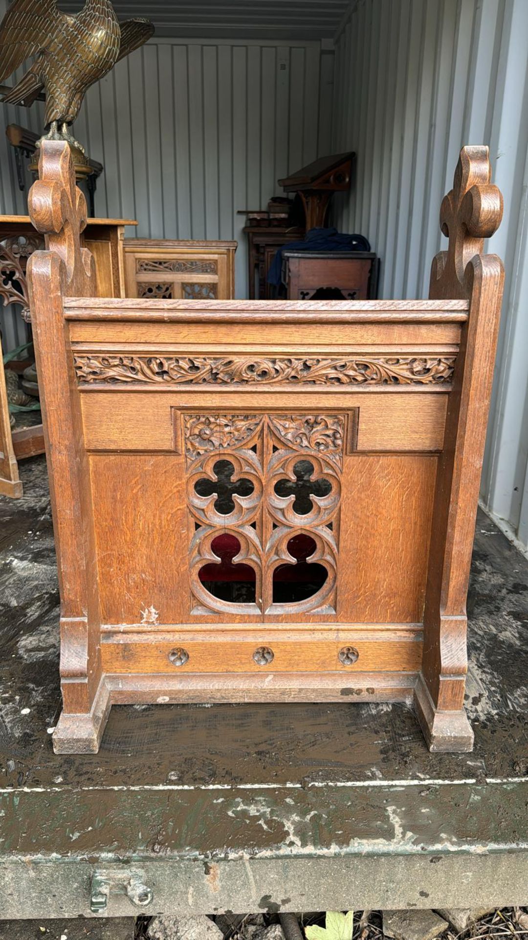 A carved gothic oak Hassock, with Fleur de Lis fin