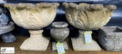 A pair of reconstituted stone garden Urns with aca