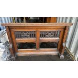 A carved gothic oak Pew Front, 32in high x 12in wi