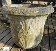 A reconstituted stone Planter with acanthus leaf d